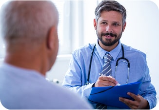Surgeon consulting with patient